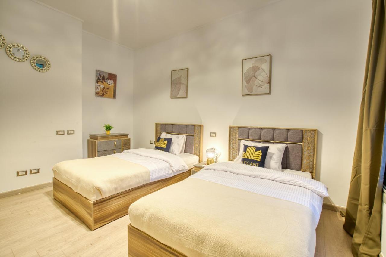 The Suites Near Auc By Elegant Il Il Cairo Esterno foto